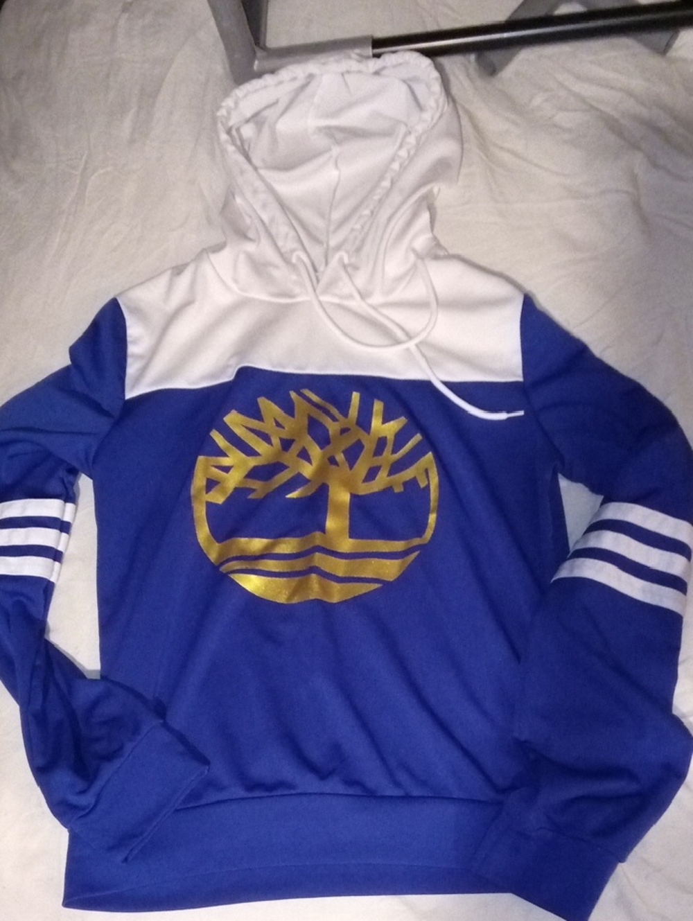 Blue and White Hooded Sweatshirt with Gold Tree Logo